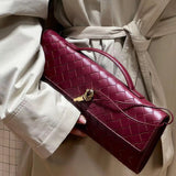 Handmade Cowhide Braided Clutch Bag